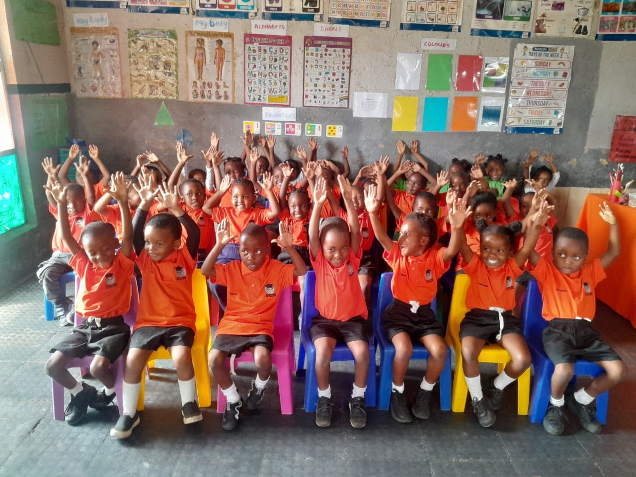 Happy children in class